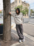 DAXUEN distressed black and white hooded jacket — model photo