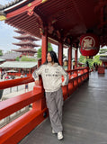 DAXUEN distressed black and white hooded jacket — model photo