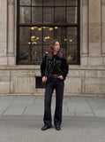 DAXUEN black distressed bootcut denim jeans — model photo