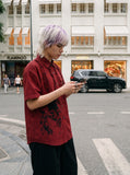DAXUEN red and black gingham distressed graphic shirt — model photo