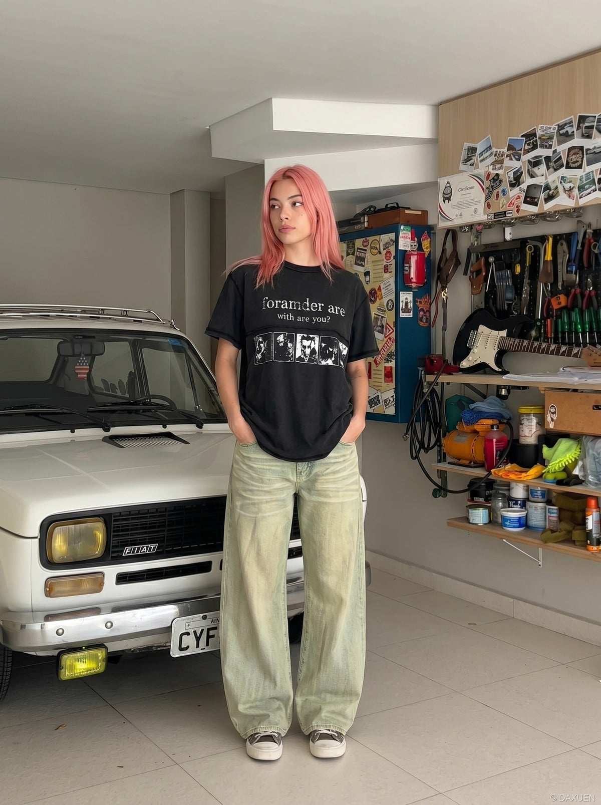 DAXUEN Black short-sleeved t-shirt with distressed text and graphics — model photo