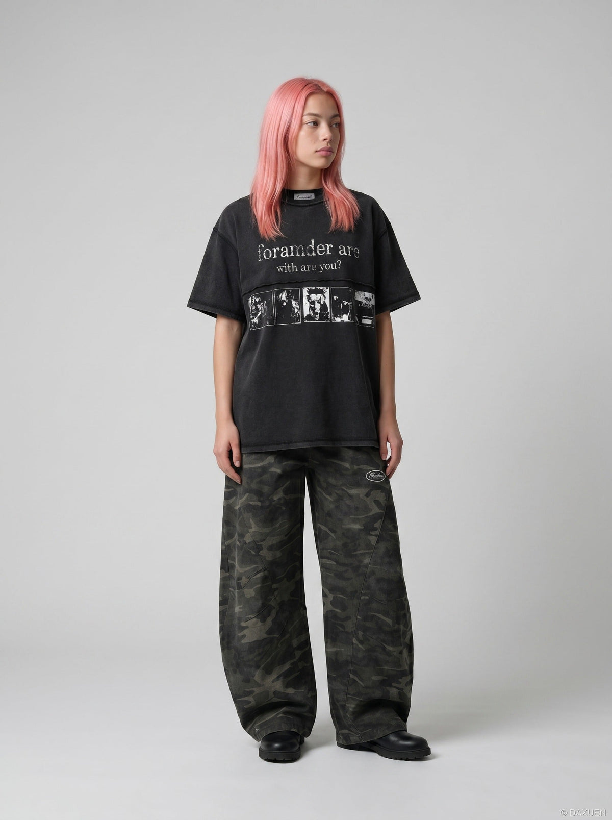 DAXUEN Black short-sleeved t-shirt with distressed text and graphics — model photo