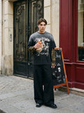 DAXUEN black layered t-shirt with distressed graphic — model photo