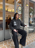 DAXUEN distressed black oversized zip jacket — model photo