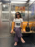 DAXUEN deep maroon distressed block lettering t-shirt — model photo