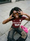 DAXUEN deep maroon distressed block lettering t-shirt — model photo