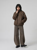 DAXUEN faded brown wide-leg sculptural pants — model photo