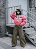 DAXUEN faded brown wide-leg sculptural pants — model photo