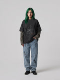 DAXUEN washed black oversized distressed camouflage layered long-sleeve tee — model photo
