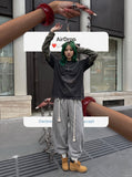 DAXUEN washed black oversized distressed camouflage layered long-sleeve tee — model photo