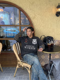 DAXUEN washed black oversized distressed camouflage layered long-sleeve tee — model photo