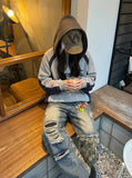 DAXUEN washed blue denim distressed patchwork wide-leg jeans — model photo