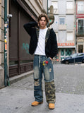 DAXUEN washed blue denim distressed patchwork wide-leg jeans — model photo