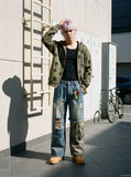 DAXUEN washed blue denim distressed patchwork wide-leg jeans — model photo