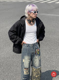 DAXUEN washed blue denim distressed patchwork wide-leg jeans — model photo