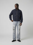 DAXUEN Distressed wide-leg jeans with camouflage pattern — model photo