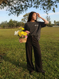 DAXUEN Distressed charcoal grey graphic t-shirt with gothic prints — model photo
