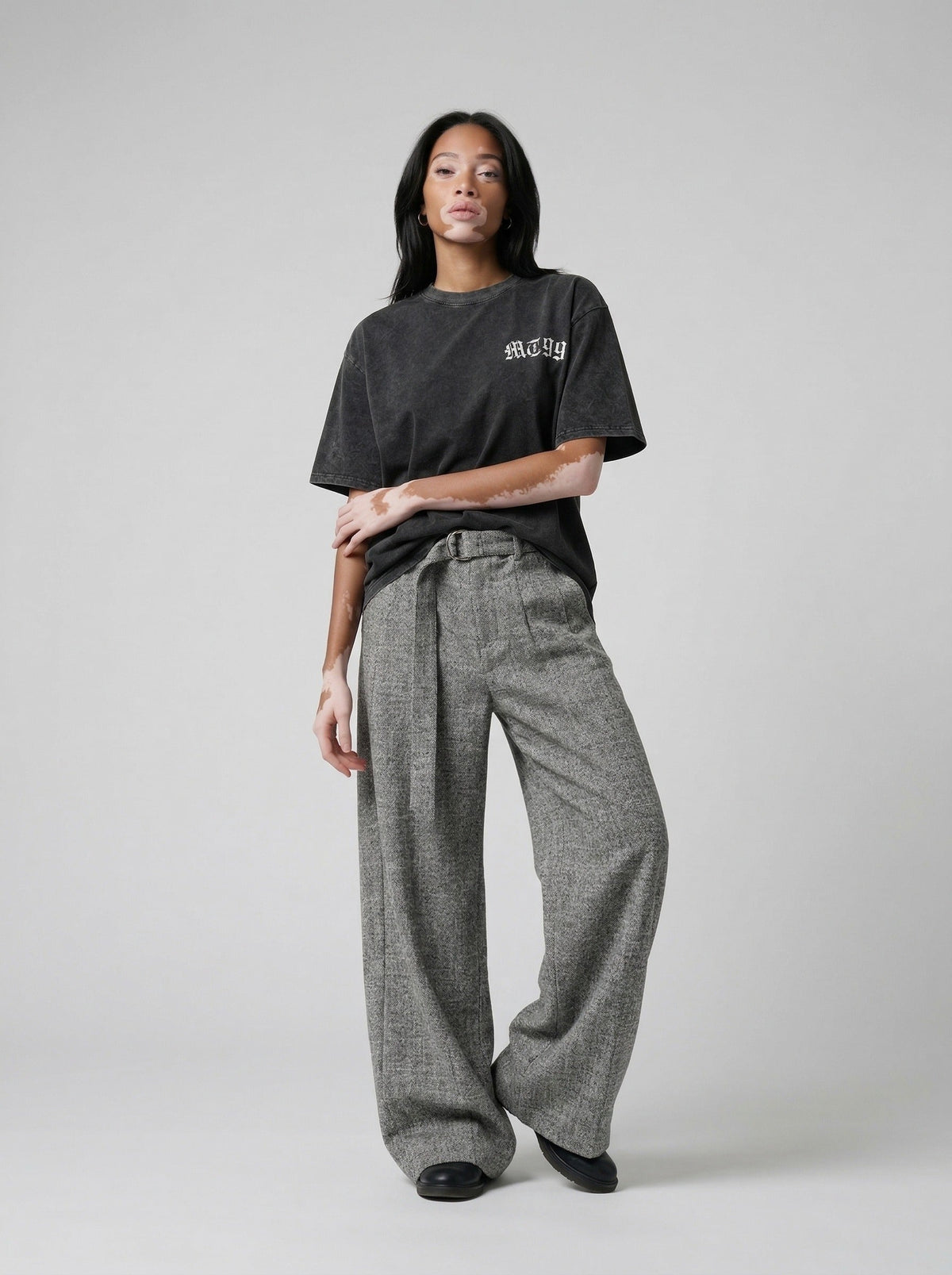 DAXUEN Distressed charcoal grey graphic t-shirt with gothic prints — model photo