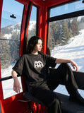 DAXUEN distressed cloud graphic oversized tee — model photo