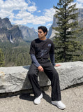 DAXUEN black distressed collegiate graphic layered t-shirt — model photo