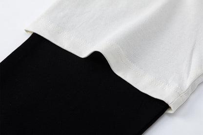 DAXUEN black distressed collegiate graphic layered t-shirt