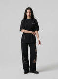 DAXUEN Distressed oversized crew neck t-shirt — model photo