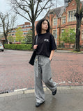 DAXUEN Distressed oversized crew neck t-shirt — model photo