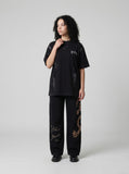 DAXUEN Distressed oversized crew neck t-shirt — model photo
