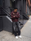 DAXUEN distressed dark burgundy hooded sweatshirt — model photo