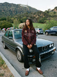 DAXUEN distressed dark burgundy hooded sweatshirt — model photo