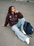 DAXUEN distressed dark burgundy hooded sweatshirt — model photo