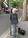 DAXUEN dark grey distressed cable knit sweater — model photo