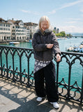 DAXUEN dark grey oversized padded jacket with faux fur hood — model photo