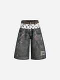 Dark grey wide-leg denim shorts featuring a double waistband with polka dots, metal chains, and stud detailing.