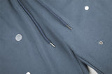 DAXUEN dark grey wide-leg pants with circular embellishments