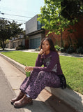 DAXUEN dark purple distressed floral graphic long-sleeve top — model photo