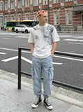 DAXUEN Distressed graphic print t-shirt with denim jacket design — model photo