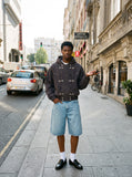 DAXUEN dark purplish-brown distressed double-breasted denim jacket — model photo