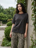 DAXUEN Distressed drop shoulder t-shirt in charcoal grey — model photo
