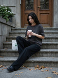 DAXUEN Distressed drop shoulder t-shirt in charcoal grey — model photo