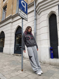 DAXUEN dark grey distressed dual-figure graphic zip hoodie — model photo