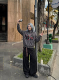 DAXUEN dark grey distressed dual-figure graphic zip hoodie — model photo