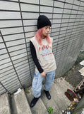 DAXUEN black oversized distressed face graphic tank — model photo