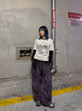 DAXUEN black distressed face graphic faux-layered long-sleeve t-shirt — model photo