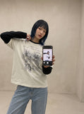 DAXUEN black distressed face graphic faux-layered long-sleeve t-shirt — model photo