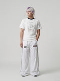 DAXUEN white t-shirt with distressed face graphic — model photo