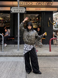 DAXUEN distressed faux leather bomber jacket — model photo