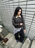 DAXUEN distressed black faux leather bomber jacket with fur collar — model photo