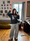 DAXUEN black distressed figures graphic long sleeve t-shirt — model photo