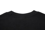 DAXUEN black knit top with distressed flag graphic